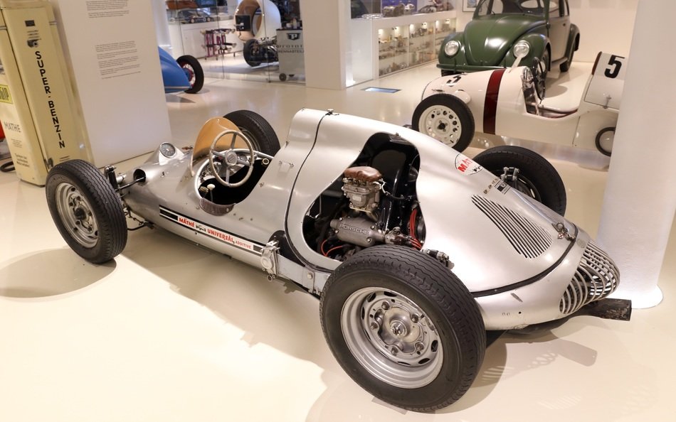 gray racing car in car dealership