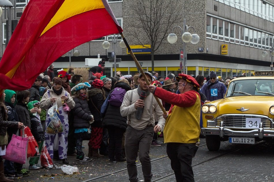 man with a flag in his hands at the festival
