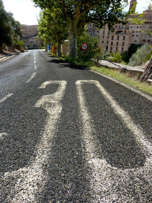 inscription '30' on the pavement
