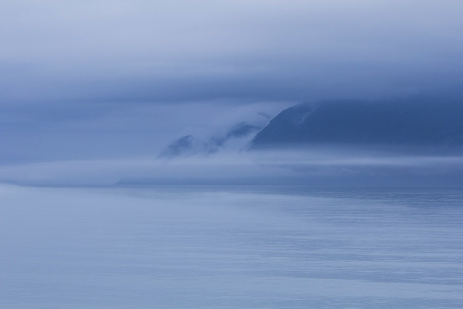 mountains in the blue fog