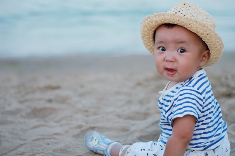 happy kid on the beach