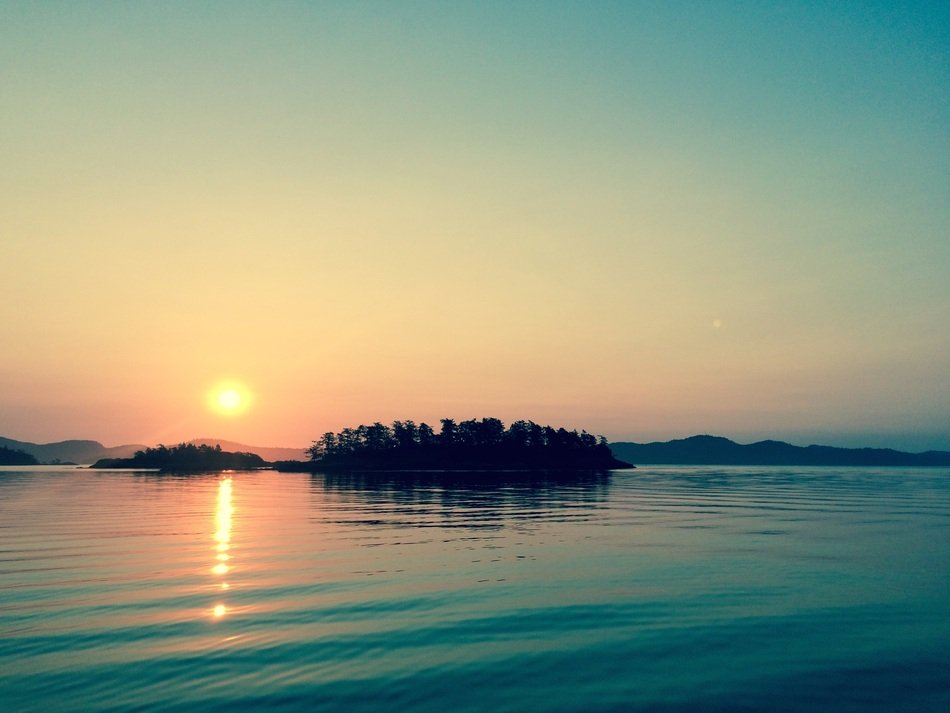 Island among the lake at sunset
