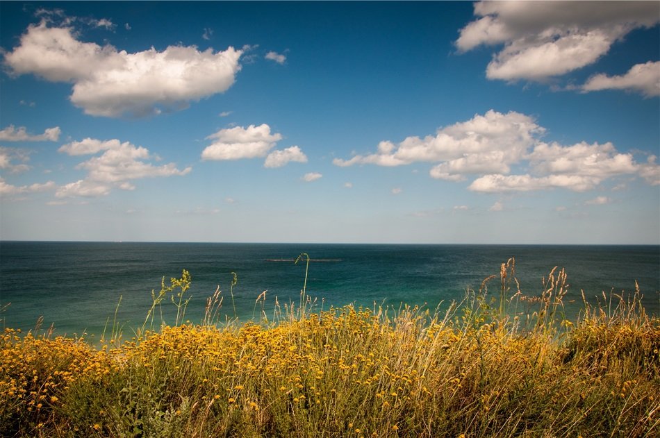 clouds above the ocean water