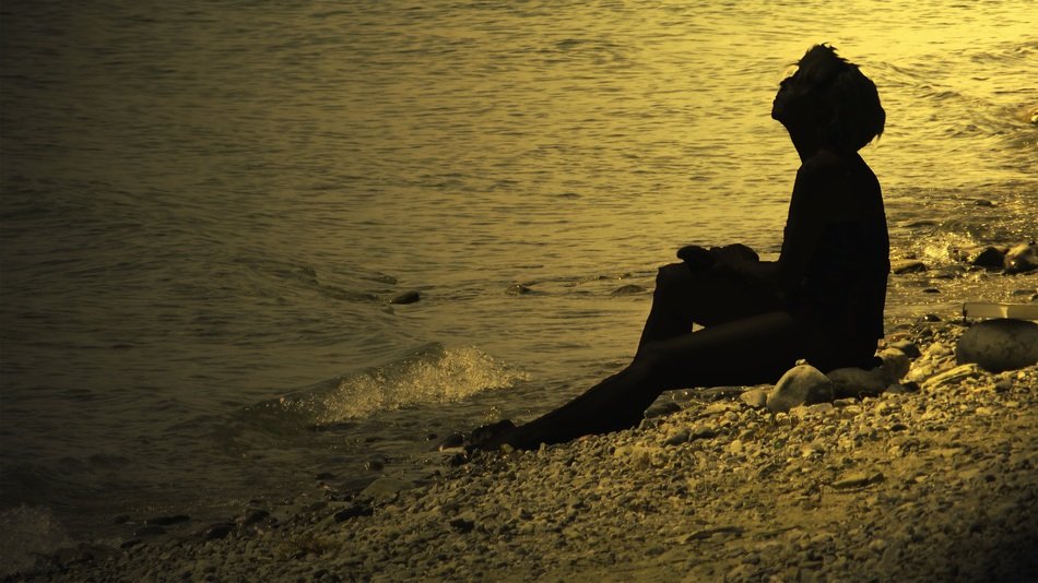 resting on the beach under sunshine to recover