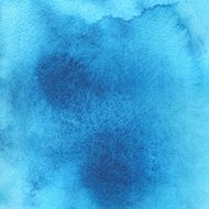 Watercolor blue paint spotted background texture