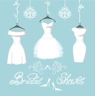 Set of three bridal dresses hang on ribbons N2