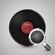 Vinyl disk with a magnifying glass