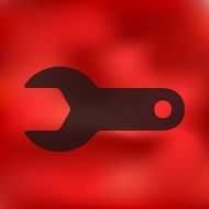 wrench icon on blurred background