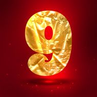 Figure 9 made of shiny golden crumpled foil