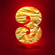 Figure 3 made of shiny golden crumpled foil