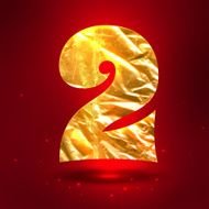 Figure 2 made of shiny golden crumpled foil