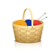 basket of rolls yarn for knitting with reflection