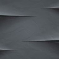 Dark grey crumpled paper cut background