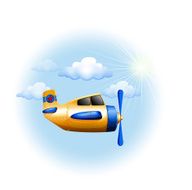 Yellow vintage plane in the sky