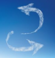 Arrow of clouds on a blue sky Vector illustration