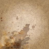 abstract grunge brown background with scratch and ink blots