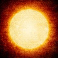 Sun on grunge canvas background