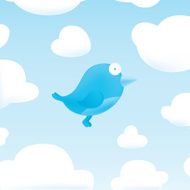 Blue bird in sky surrounded by clouds