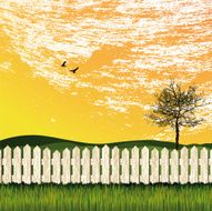 picket fence with grass tree and yellow sky