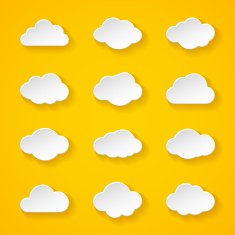 Twelve white paper clouds with different shapes