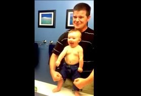 happy young man with toddler boy