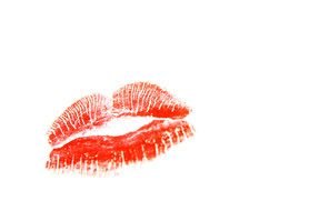 red trace of lipstick on a white background