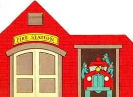 picture of a fire station with a fire truck