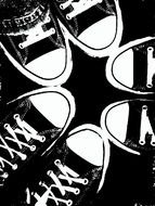 three pairs of black and white sneakers