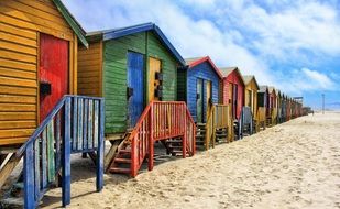 colorful beach houses on the beach in south africa