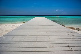 Wooden pier on the tropical beach
