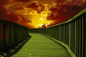 painted green bridge on golden sunset background