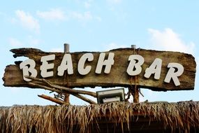 sign on the beach bar