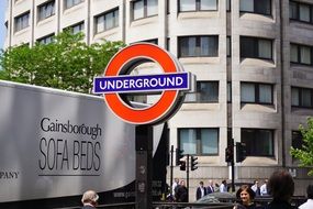 underground london metro shield near the building