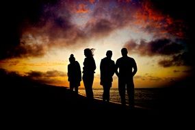 sunset silhouettes on the beach