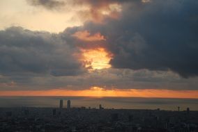 sunrise in the clouds over barcelona