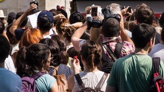 mass tourism with cameras