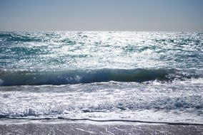 sea waves splashing on beach, spain, cadiz