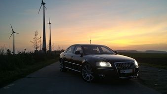 Audi on the road at dusk