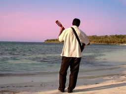 musician on the beach