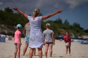 Humans having fun on a summer beach