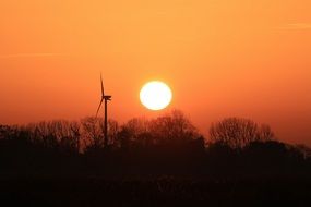 wind turbine at sunset