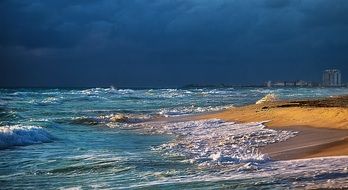 sea waves splashing on beach