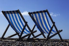 Beachr chairs on the stones