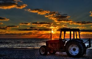 Tractor at the sunset