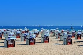 folded loungers on the beach of the Baltic Sea