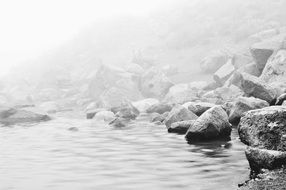 Tranquil mist on the rock beach