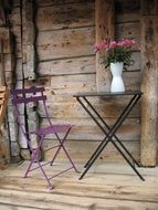 table chair and vase on the terrace