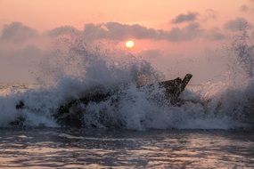 orange sunset water waves landscape