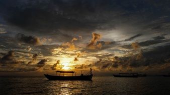 boat at sunset in Cambodia