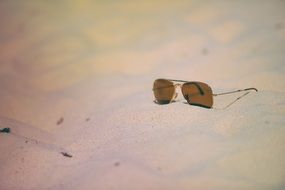 Brown sunglasses beach sand summer